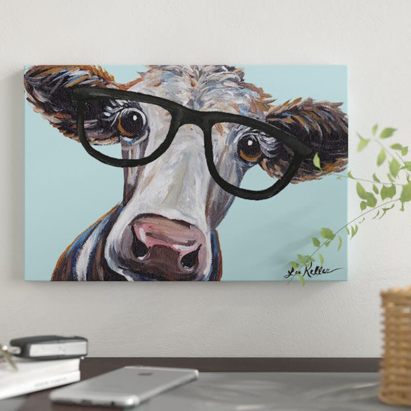 <p><a href="https://go.redirectingat.com?id=74968X1596630&url=https%3A%2F%2Fwww.wayfair.com%2F--%2Fpdp%2Feast-urban-home--cora-the-cow-with-glasses-graphic-art-print-on-canvas-fcit4263-l1318-ebhs3152.html&sref=https%3A%2F%2Fwww.thepioneerwoman.com%2Fhome-lifestyle%2Fdecorating-ideas%2Fg44076346%2Fcow-decor%2F" rel="nofollow noopener" target="_blank" data-ylk="slk:Shop Now;elm:context_link;itc:0;sec:content-canvas" class="link ">Shop Now</a></p><p>'Cora the Cow with Glasses' Graphic Art Print</p><p>$35.99</p><p>wayfair.com</p><span class="copyright">Wayfair</span>