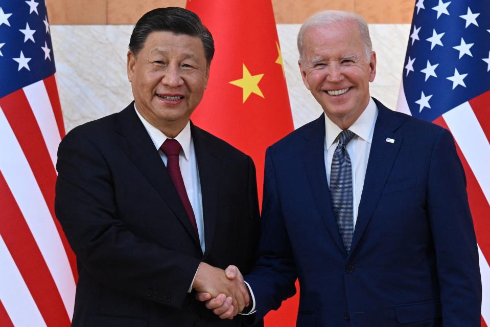 US President Joe Biden (R) and China's President Xi Jinping (L) shake hands as they meet on the sidelines of the G20 Summit in Nusa Dua on the Indonesian resort island of Bali on November 14, 2022. (Photo by SAUL LOEB / AFP) (Photo by SAUL LOEB/AFP via Getty Images)