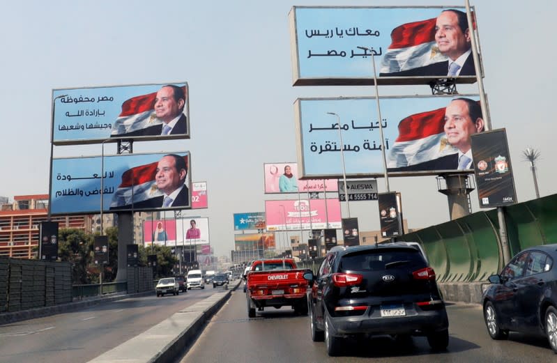 FILE PHOTO: Cars move along the '6th October Bridge' in Cairo