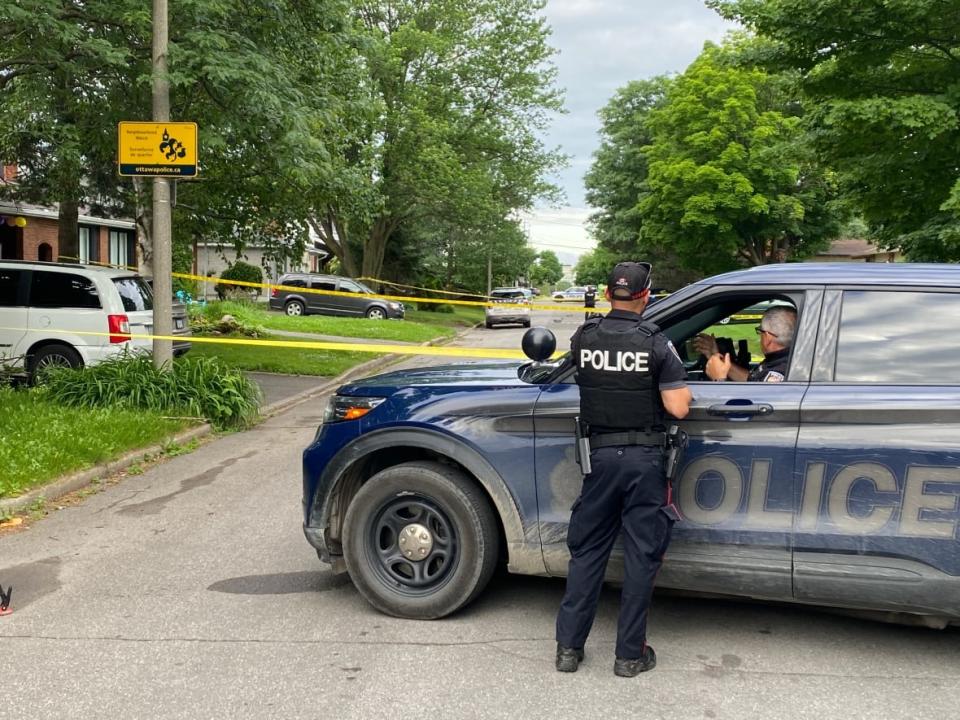 Ottawa police cordon off a residential street in Alta Vista just south of Heron Road on Tuesday, one day after a fatal stabbing left three people dead ⁠— including the suspect, who was shot by police. (Michelle Allan/CBC - image credit)