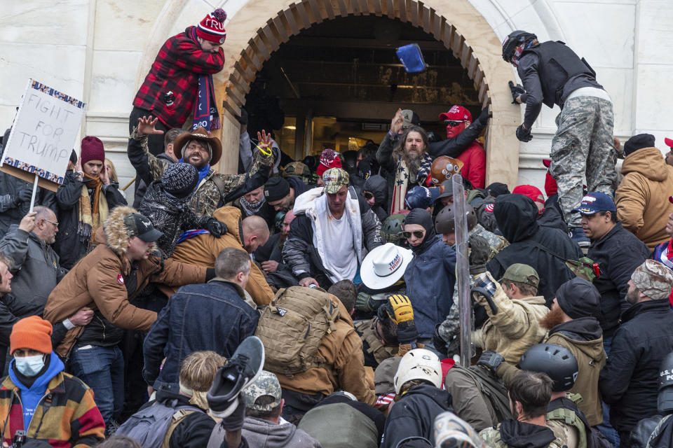 Rioters clash with police as they try to enter the Capitol on Jan. 6. (Photo: Pacific Press via Getty Images)