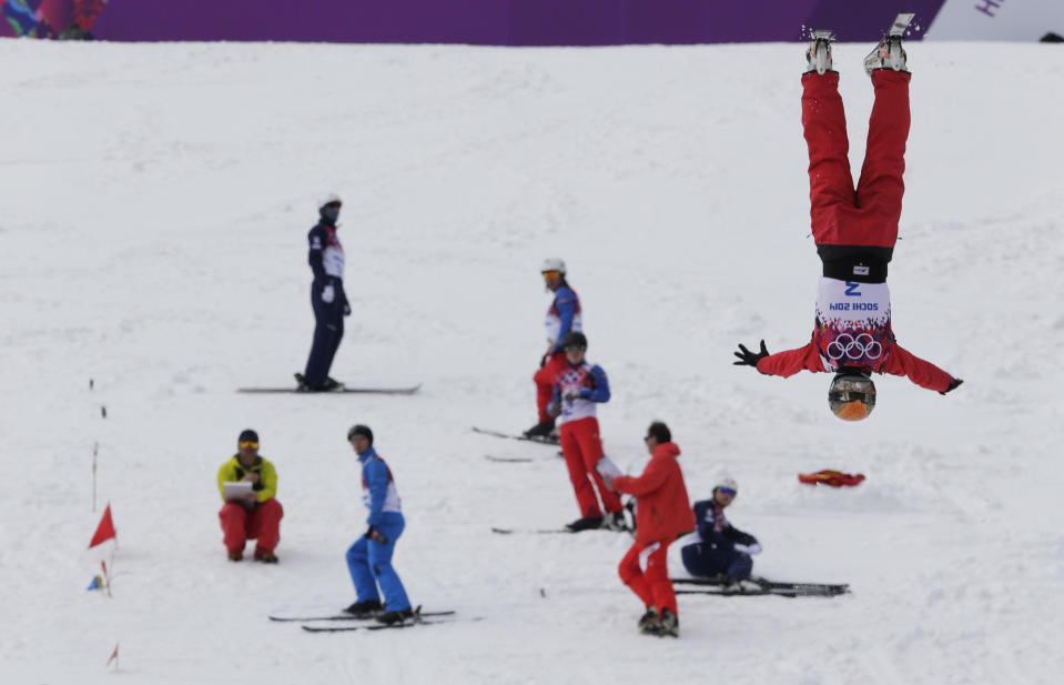 China's Xu Mengtao jumps during freestyle skiing aerials training at the Rosa Khutor Extreme Park at the 2014 Winter Olympics, Monday, Feb. 10, 2014, in Krasnaya Polyana, Russia. (AP Photo/Andy Wong)