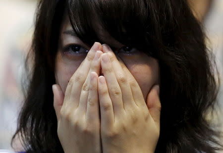 A Japan soccer fan cries after Japan lost their FIFA Women's World Cup final match against the U.S. in Vancouver, at a public viewing event in Tokyo, Japan, July 6, 2015. REUTERS/Toru Hanai