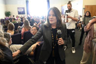 Democratic presidential candidate Marianne Williamson listens to member of the audience at The Interfaith Center for Spiritual Growth, Sunday, Sept. 10, 2023, in Ann Arbor, Mich. (AP Photo/Jose Juarez)
