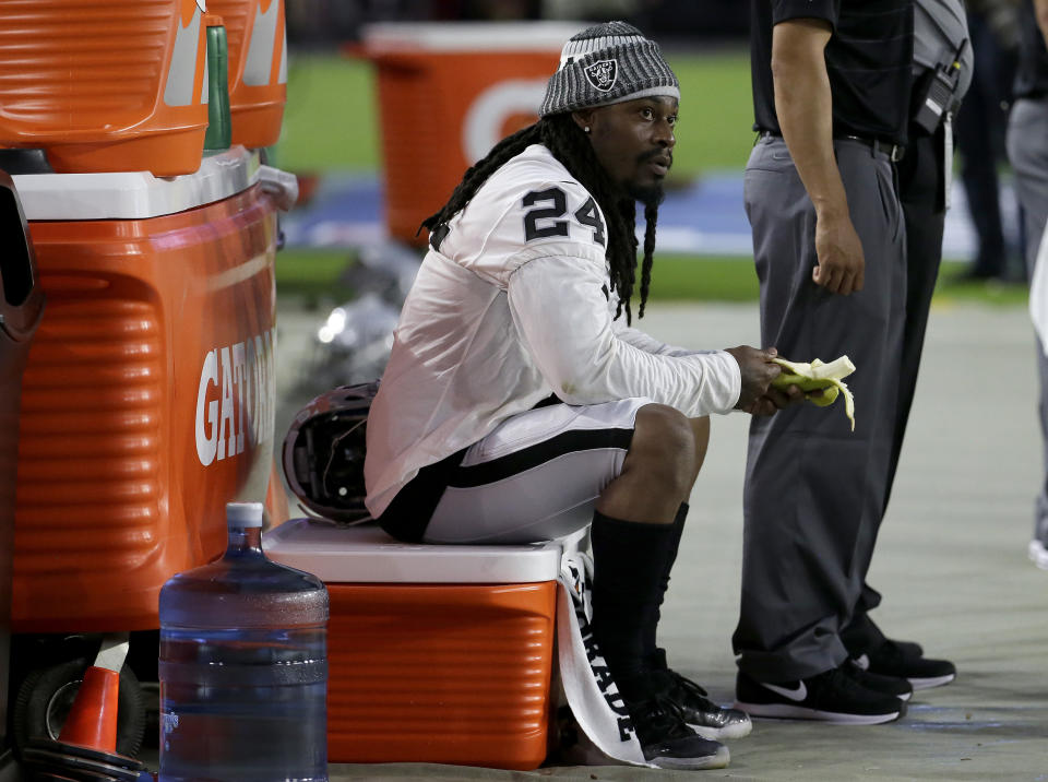 Marshawn Lynch sits during the national anthem prior to the Raiders preseason game. (AP)