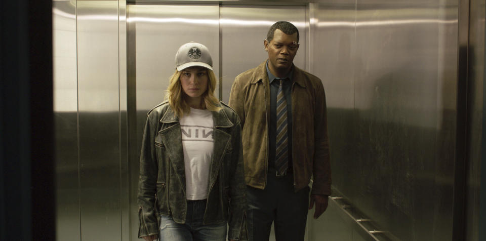 This image released by Disney-Marvel Studios shows Brie Larson, left, and Samuel L. Jackson in a scene from "Captain Marvel." (Disney-Marvel Studios via AP)