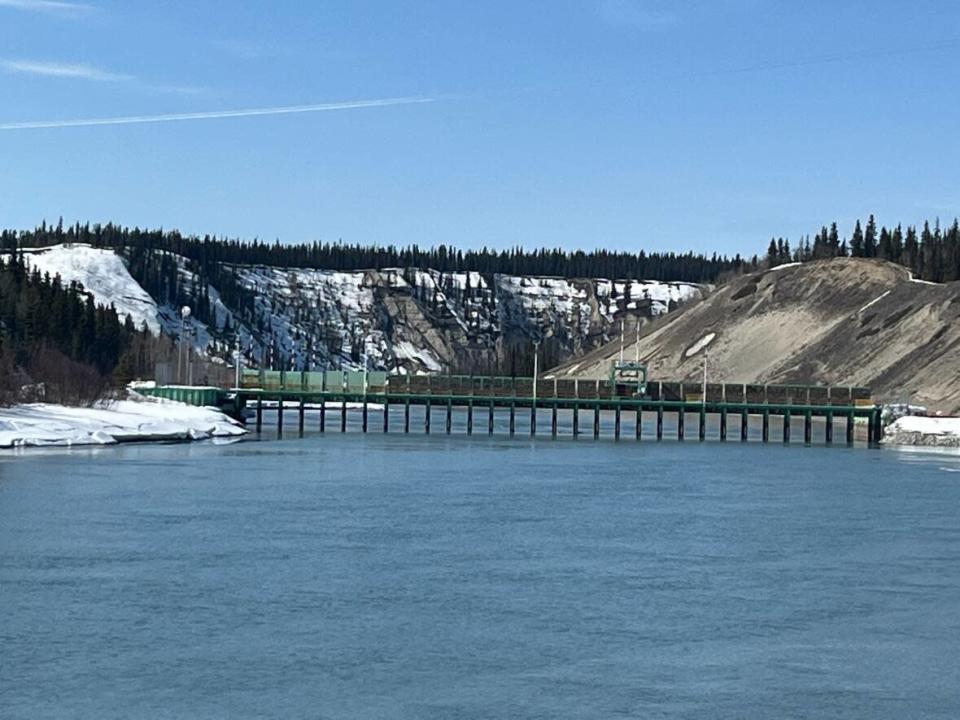 The Lewes River control structure, south of Whitehorse. Yukon Energy said it opened all the gates at the structure which regulates water flow going downstream towards Whitehorse and north of the territory, eventually emptying into the Bering Sea. (Michel Proulx/CBC - image credit)