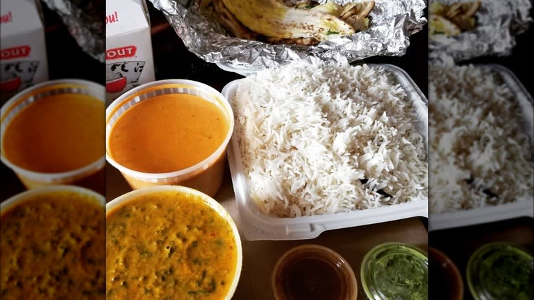 indian curry, rice, and dips