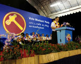 WP chief Low Thia Khiang stands at the podium at the party's third rally in Punggol East. (Yahoo! Photo)