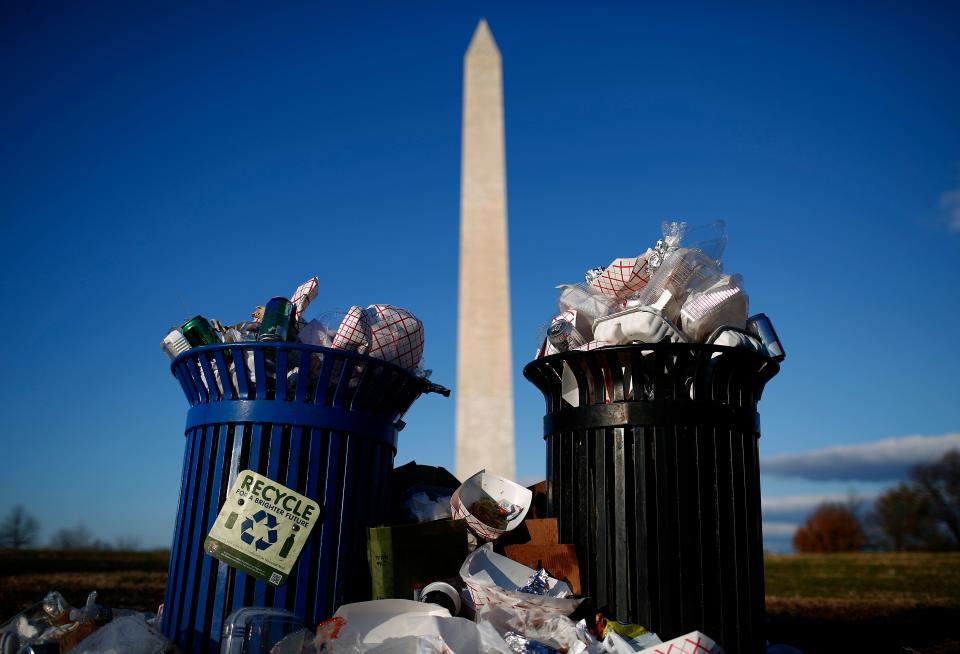 Trash begins to accumulate along the National Mall near the Washington Monument due to a partial shutdown of the federal government on Dec. 24, 2018 in Washington, DC.  All National Parks visitors centers remain closed as the shutdown continues after Congress and President Trump are at an impasse over the funding of the President's proposed southern border barrier.