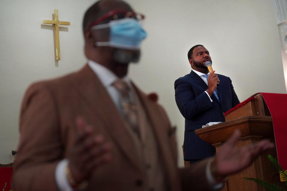 The Rev. M. Andrew Davis, right, leads worship service at Zion Baptist Church on Sunday, April 16, 2023, in Columbia, S.C. Zion's shrinking attendance is in line with a recent Pew Research Center survey, which found that the number of Black Protestants who say they attend services monthly has fallen from 61% in 2019 to 46%. Davis attributes the hesitancy to return to church in person to the average age of his congregants, inadequate access to health care, and fear of catching a contagious illness. (AP Photo/Jessie Wardarski)