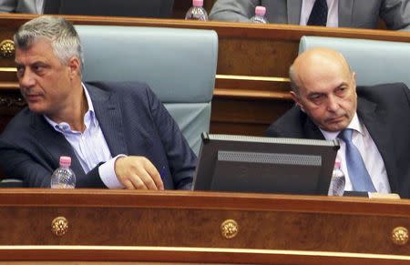 Kosovo's Prime Minister Isa Mustafa (R) sits next to Deputy Prime Minister and Foreign Minister Hashim Thaci (L) during a parliament session in Pristina, Kosovo August 3, 2015. REUTERS/Hazir Reka