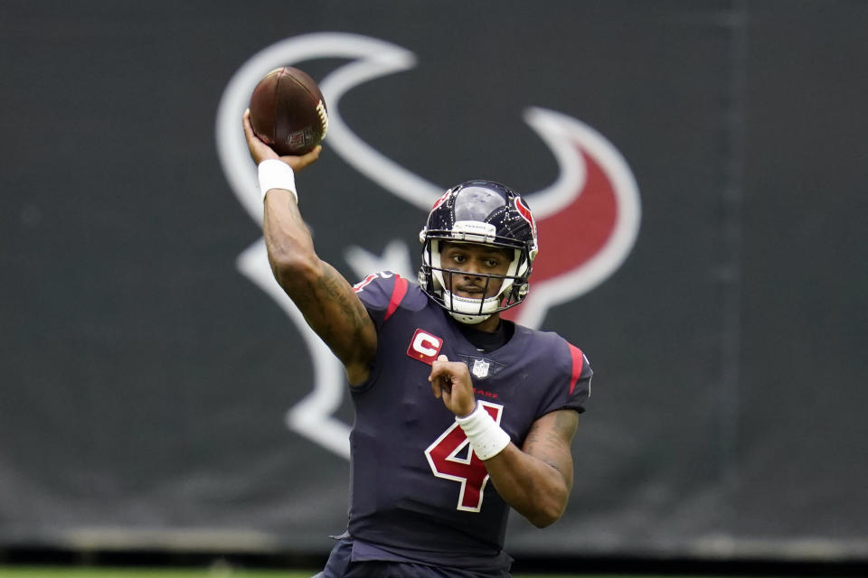 FILE - In this Dec. 27, 2020, file photo, Houston Texans quarterback Deshaun Watson throws a pass during an NFL football game against the Cincinnati Bengals in Houston. Watson has been sued by four more women who accuse him of sexual assault and harassments. The lawsuits were filed Thursday night, March 18, 2021, hours after the NFL said it was investigating earlier allegations by three massage therapists who said the quarterback sexually assaulted them during massages. (AP Photo/Matt Patterson, File)