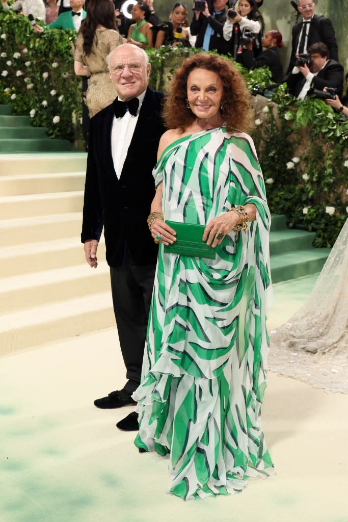 Barry Diller and Diane von Furstenberg attend The 2024 Met Gala Celebrating "Sleeping Beauties: Reawakening Fashion" at The Metropolitan Museum of Art on May 06, 2024 in New York City.
