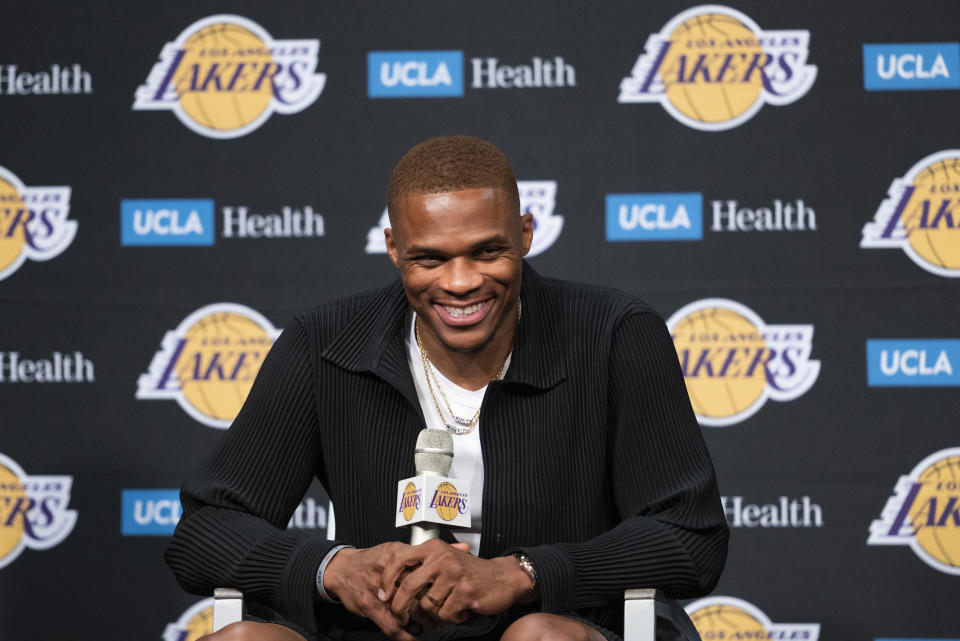 Los Angeles Lakers guard Russell Westbrook smiles during an introductory NBA basketball news conference in Los Angeles, Tuesday, Aug. 10, 2021. (AP Photo/Kyusung Gong)