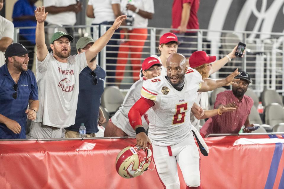 Birmingham Stallions quarterback J'mar Smith (6) greets fans after a Week 3 win over the New Orleans Breakers.