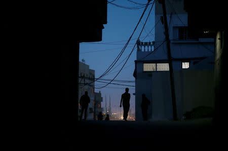 A Palestinian man walks during power cut at Shati refugee camp in Gaza City April 25, 2017. REUTERS/Mohammed Salem