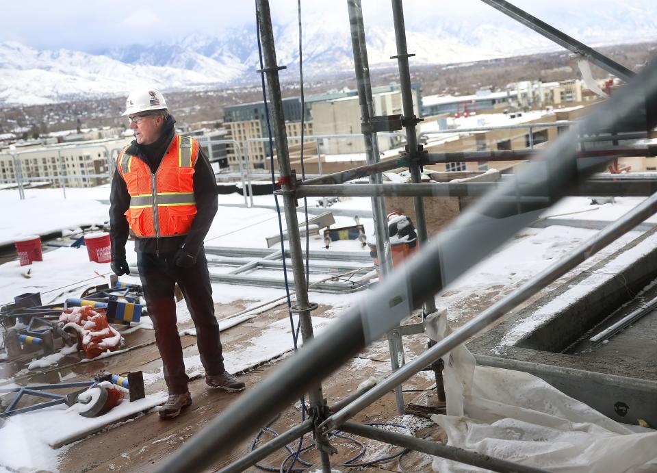Dave Layton, president & CEO of Layton Construction, surveys the construction of The Worthington in Salt Lake City.