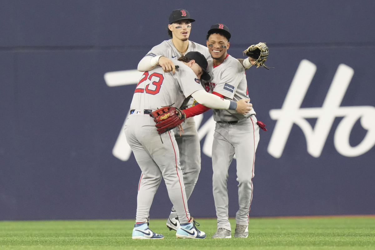 Trevor Story hits a double in the 10th inning as the Red Sox beat the Blue Jays 6-5