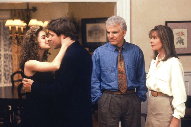<p>Touchstone/Kobal/Shutterstock</p> Kimberly Williams, George Newbern, Steve Martin and Diane Keaton in <i>Father of the Bride</i>, 1991