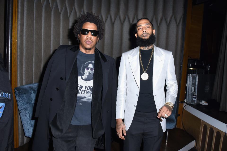 Jay-Z, left, and Nipsey Hussle attend the PUMA x Nipsey Hussle 2019 Grammy Nomination Party at The Peppermint Club on Jan. 16, 2019, in Los Angeles.