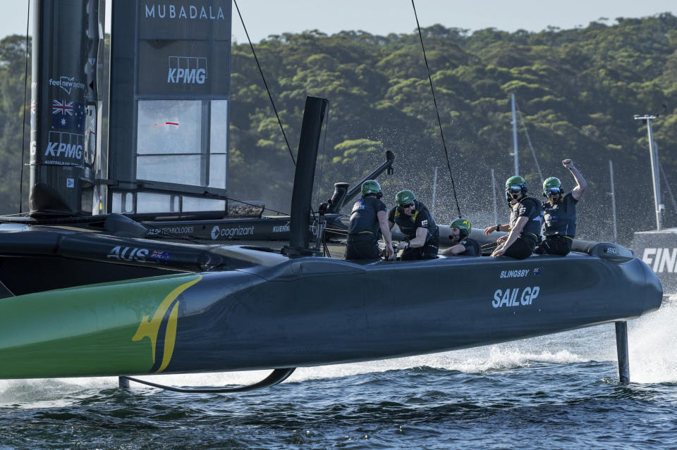 Australia SailGP Team helmed by Tom Slingsby celebrates winning the KPMG Australia Sail Grand Prix in Sydney, Australia. Sunday, Feb. 25, 2024. (Ricardo Pinto/SailGP via AP)