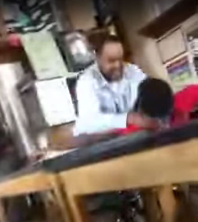 In the video the aide rushed and choke-slammed the student. Source: CBS58