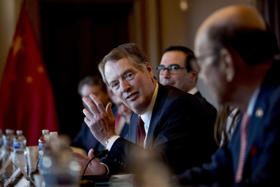 US Trade Representative Robert Lighthizer, pictured, accompanied by Trump Administration officials, speaks as they meet with Chinese Vice Premier Liu He, and other Chinese officials as they begin US-China Trade Talks in the Diplomatic Room of the Eisenhower Executive Office Building on the White House Complex, Wednesday, Jan. 30, 2019, in Washington. (AP Photo/Andrew Harnik)
