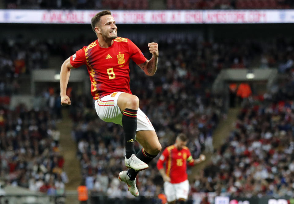 Spain's Saul Niguez celebrates after scoring his side's first goal during the UEFA Nations League soccer match between England and Spain at Wembley stadium in London, Saturday Sept. 8, 2018. (AP Photo/Frank Augstein)