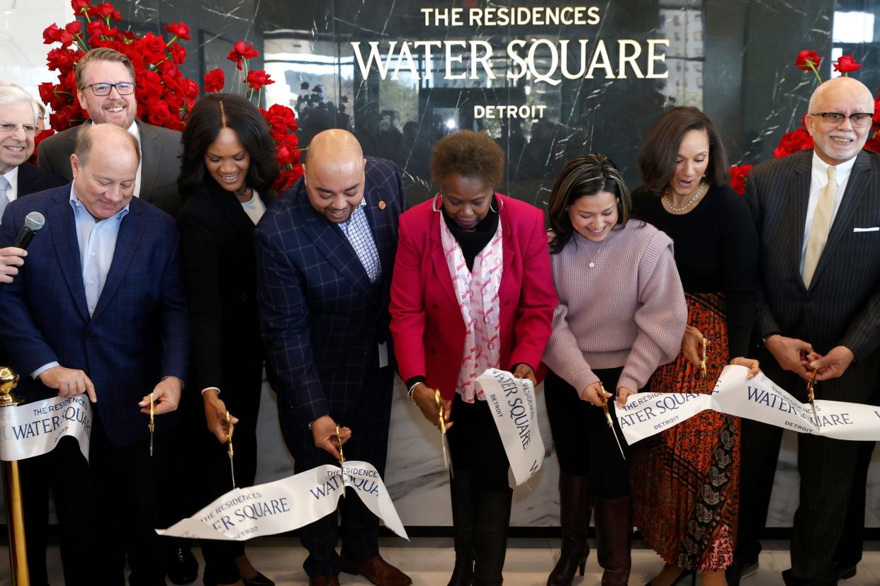 Various dignitaries from the mayor of Detroit to members of the Detroit City Council ceremoniously cut the ribbon in the lobby of The Residences at Water Square at the new luxury apartment tower at the site of the former Joe Louis Arena in Detroit on Tuesday, Feb. 6 2024.
