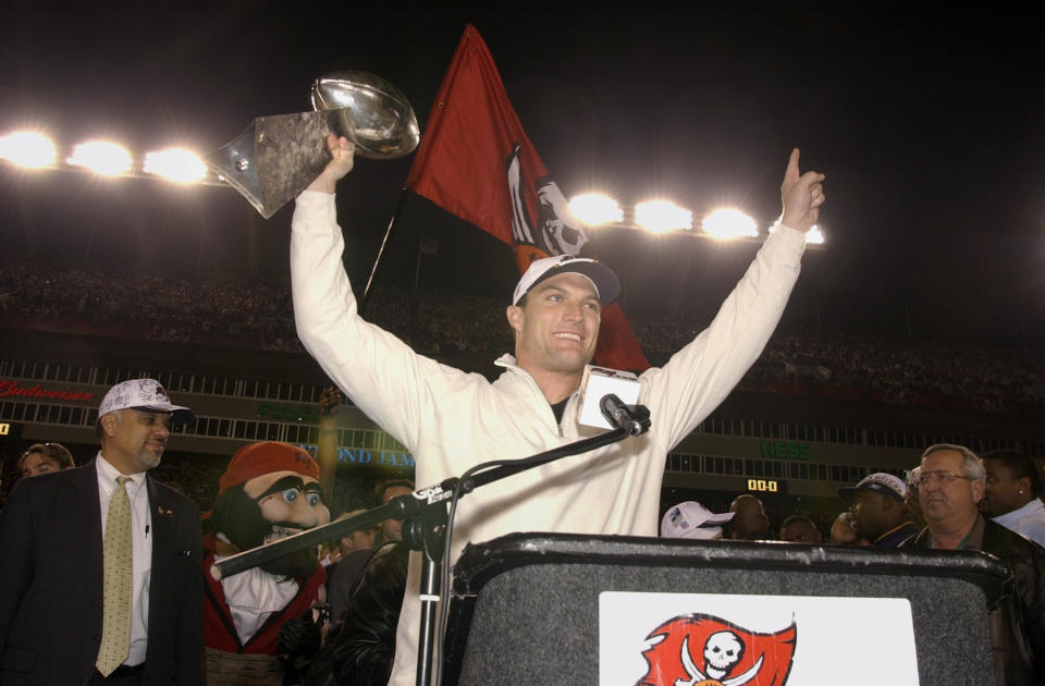 FILE - In this Jan. 27, 2003, file photo, Tampa Bay Buccaneers' John Lynch holds the Vince Lombardi Trophy during a victory celebration at Raymond James Stadium in Tampa, Fla. Lynch earned his first of nine Pro Bowl selections in his second season as a full-time starter in 1997, was named an All-Pro in back-to-back seasons in 1999 and 2000 and then played a big part in Tampa’s first Super Bowl title in the 2002 season. (AP Photo/Scott Martin, File)