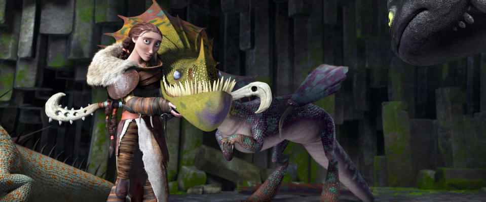Valka standing with a dragon