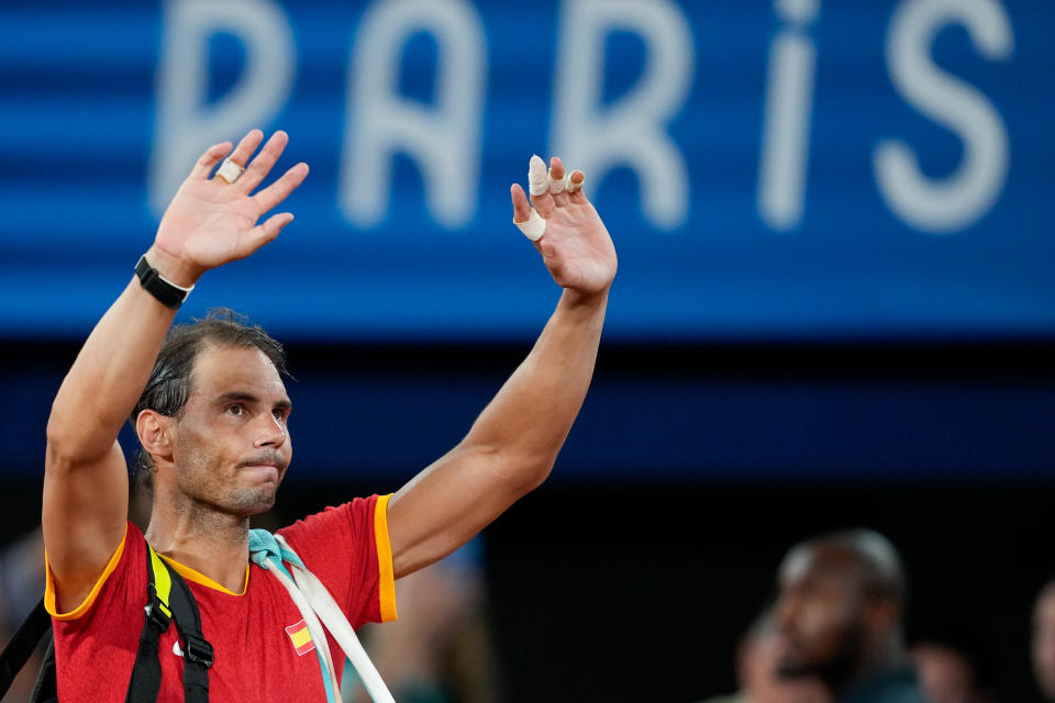 PARIS, FRANCE - JULY 31: Rafael Nadal of Spain waves to the crowd after losing in the Men's Doubles Quarterfinals on day five of the Paris 2024 Olympic Games at Roland Garros on July 31, 2024 in Paris, France. (Photo by Eurasia Sport Images/Getty Images)