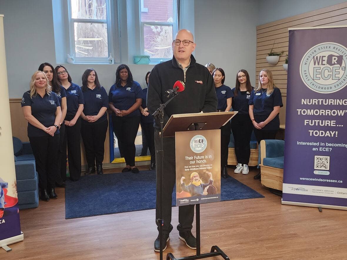 Mayor Drew Dilkens, commissioner of Human Health Services Andrew Daher and manager of children's services Dawn Bosco were all present at a local daycare on Thursday to promote an initiative aimed at recruiting early childhood educators.  (TJ Dhir/CBC - image credit)