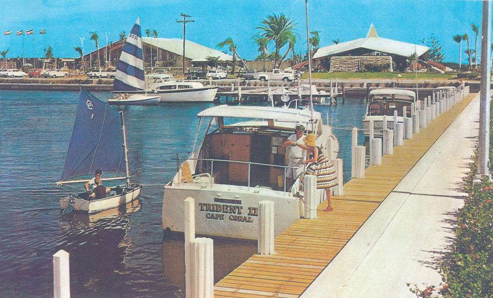 The Yacht Club Basin showing Million Dollar Yacht and Racquet Club and Americas first Youth Key Club, the right building in background.