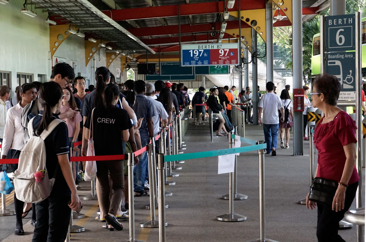 The queue seen for one of the shuttle buses at Jurong East Bus Interchange on Sunday (10 December). (PHOTO: Dhany Osman / Yahoo News Singapore)