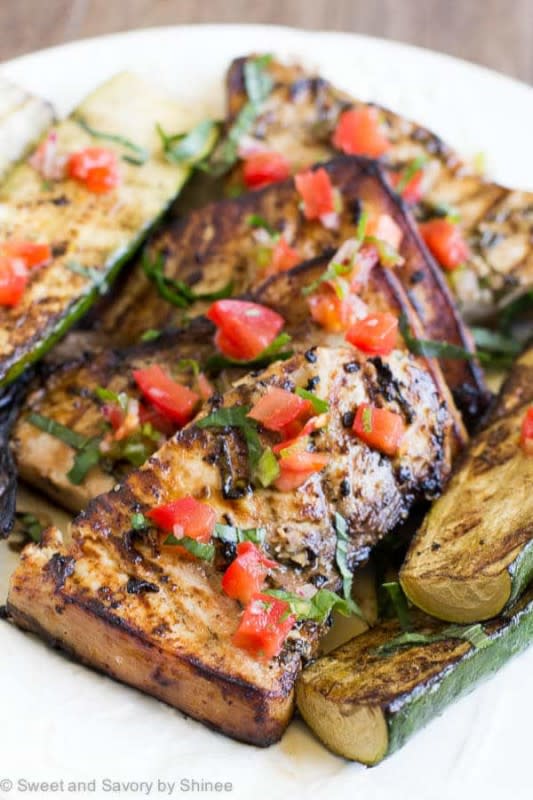 <p>Sweet and Savory by Shinee</p><p>Simple, flavorful dinner in minutes! Add this lime basil grilled swordfish steaks to your busy weeknight menu and enjoy melt-in-your-mouth-tender flakes with side of your favorite vegetables in less than 30 minutes.</p><p><strong>Get the recipe: <a href="https://www.sweetandsavorybyshinee.com/lime-basil-grilled-swordfish-steaks/" rel="nofollow noopener" target="_blank" data-ylk="slk:Lime Basil Grilled Swordfish Steaks;elm:context_link;itc:0;sec:content-canvas" class="link rapid-noclick-resp">Lime Basil Grilled Swordfish Steaks</a></strong></p>