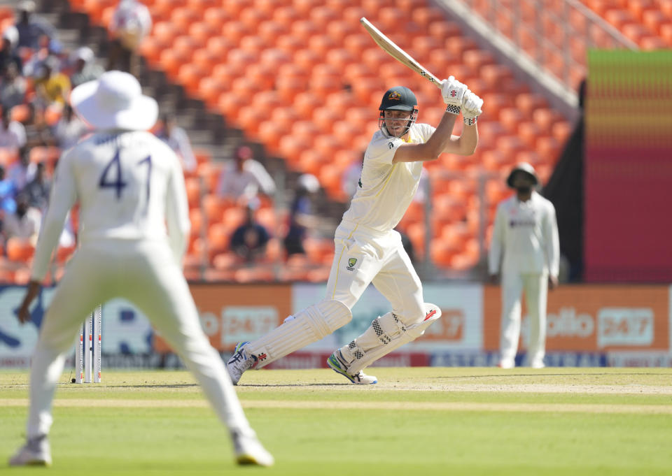 Australia's Cameron Green, center, plays a shot during the second day of the fourth cricket test match between India and Australia in Ahmedabad, India, Friday, March 10, 2023. (AP Photo/Ajit Solanki)