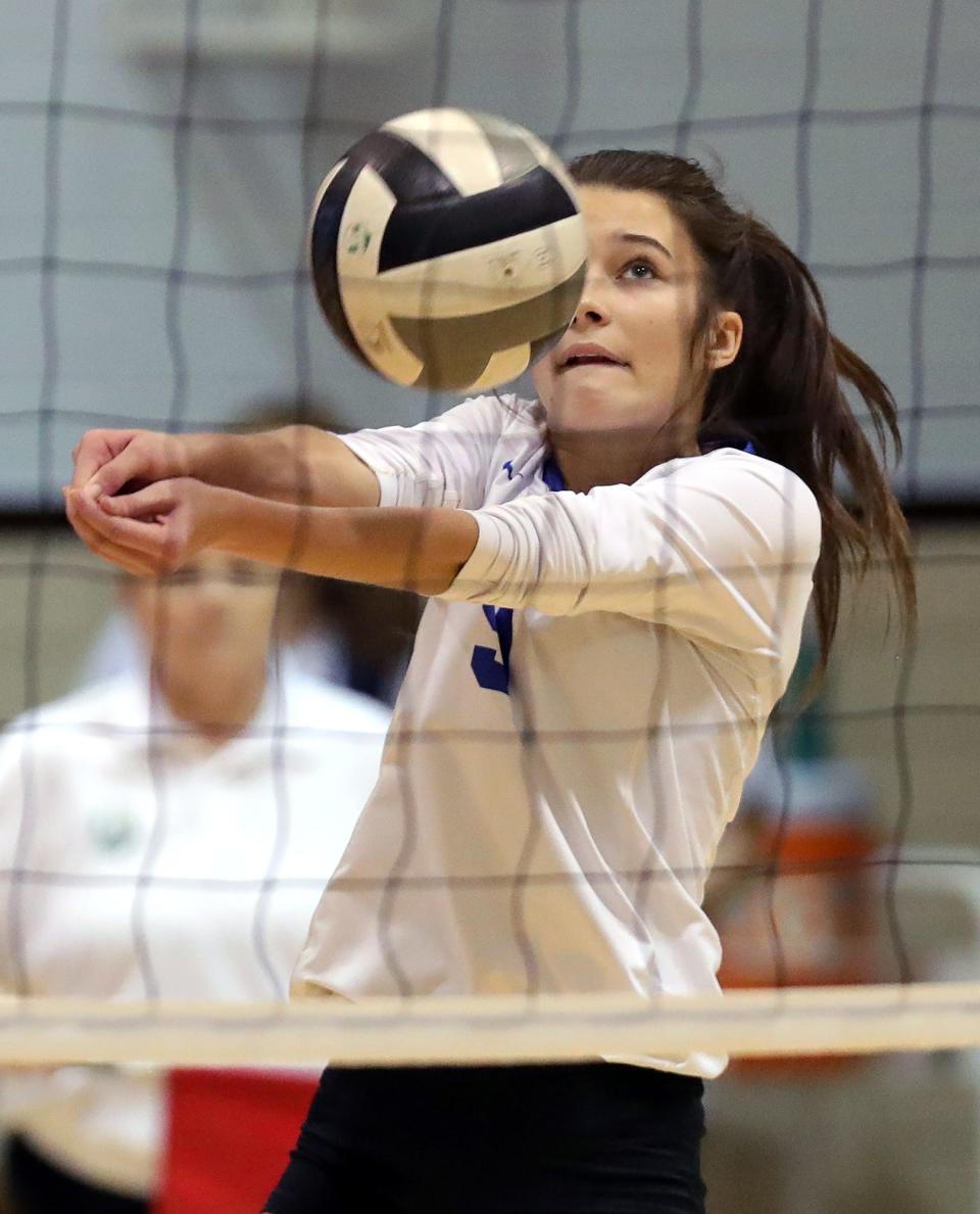 CVCA sophomore Hallie Hendrickx hits the ball back over the net during a Division II sectional against STVM on Oct. 19, 2022, in Akron.