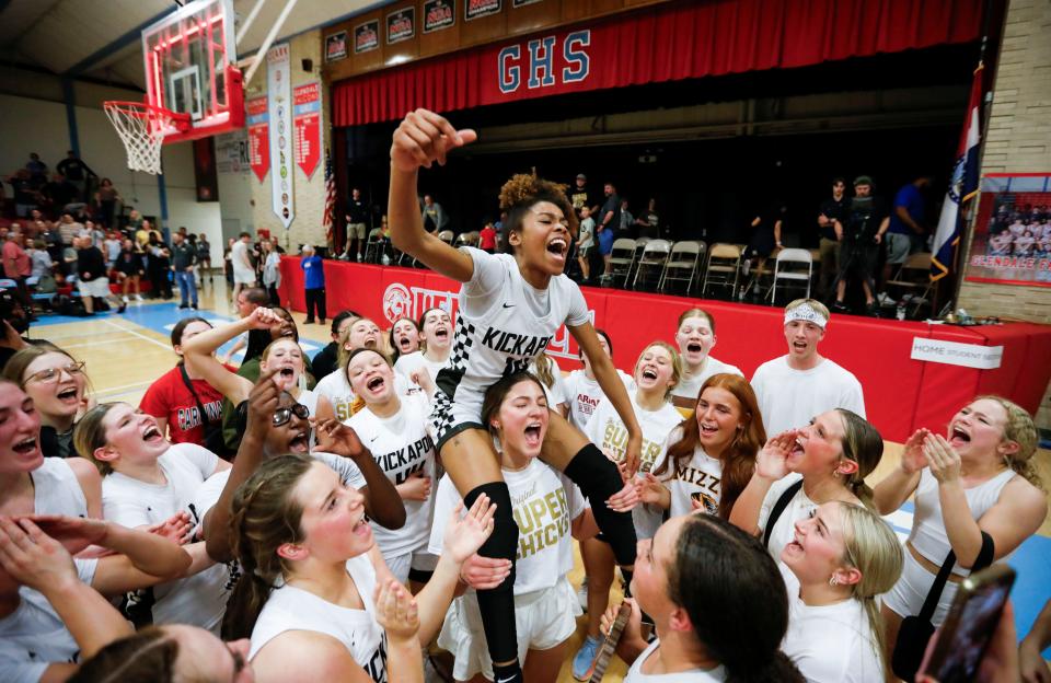 Kickapoo's Ari Mosley is hoisted into the air after the Lady Chiefs beat the Republic Tigers in the Class 6 District 5 championship game at Glendale High School on Monday, March 4, 2024.