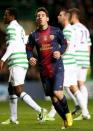 Barcelona's Argentinian forward Lionel Messi reacts to a close effort during their UEFA Champions League Group G football match at Celtic Park in Glasgow. Celtic sent shockwaves around Europe as they produced a stunning 2-1 Group G win over Barcelona at Parkhead