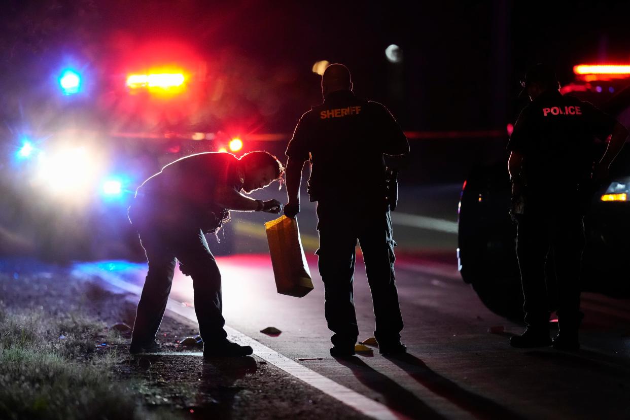 Jul 22, 2023; Columbus, Ohio, USA;  Franklin County Sheriffs deputies and Franklin Township Police investigate the scene of a shooting on the South Side. Blood evidence was collected and more than 30 shell casings were found at the scene near the intersection of Hart and Brown roads.
