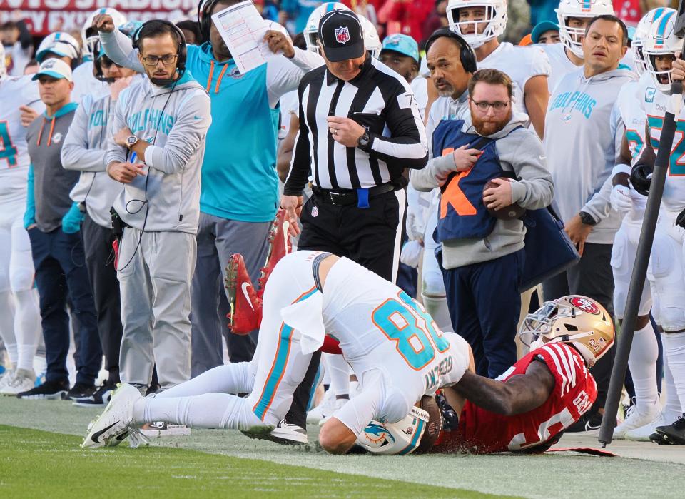 Dec 4, 2022; Santa Clara, California, USA; San Francisco 49ers linebacker Dre Greenlaw (57) prevents the pass intended for Miami Dolphins tight end Mike Gesicki (88) during the fourth quarter at Levi's Stadium. Mandatory Credit: Kelley L Cox-USA TODAY Sports