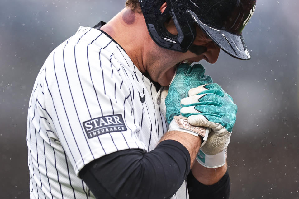 NEW YORK, NEW YORK - SEPTEMBER 28: Anthony Rizzo #48 of the New York Yankees bites his hand after being hit by a pitch during the seventh inning of the game against the Pittsburgh Pirates at Yankee Stadium on September 28, 2024 in New York City. (Photo by Dustin Satloff/Getty Images)