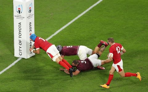 Justin Tipuric of Wales scores his sides second try as he is tackled by Beka Gorgadze - Credit: &nbsp;Mike Hewitt/Getty Images