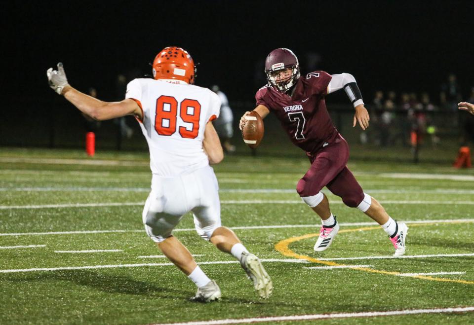 Verona's Cael Zebrowski runs the ball as Mountain Lakes' Marco Dzamba defends during the first half of a SFC National White football game at Verona High School on October 08, 2021.  Alexandra Pais/ for the Daily Record