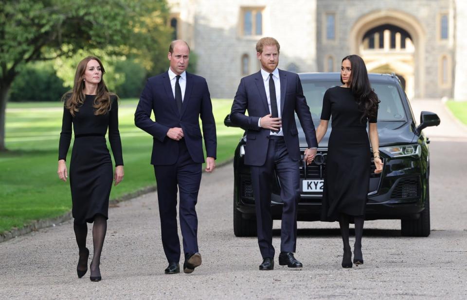 Kate and William reunited with Harry and Meghan to greet people gathered at Windsor on Saturday (PA Wire)