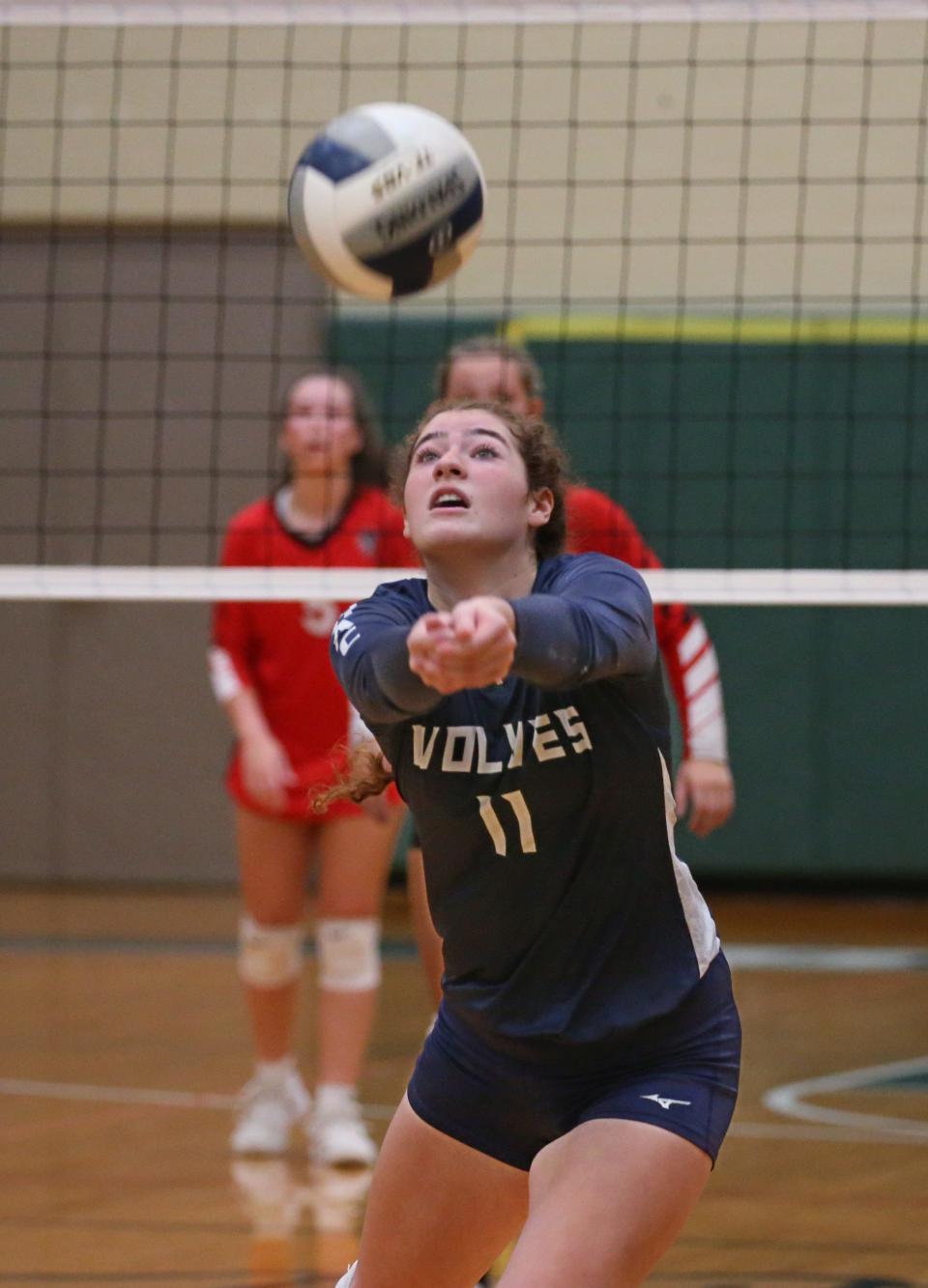 HAC setter Tori Colosimo (11), races back to send the ball back towards the net during their Class D1 girls volleyball finals Saturday, Nov. 5, 2022, at Avon High School.  