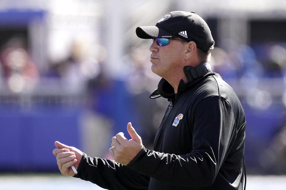 Kansas head coach Lance Leipold motions to his players during the second half of an NCAA college football game against TCU Saturday, Oct. 8, 2022, in Lawrence, Kan. TCU won 38-31. (AP Photo/Charlie Riedel)