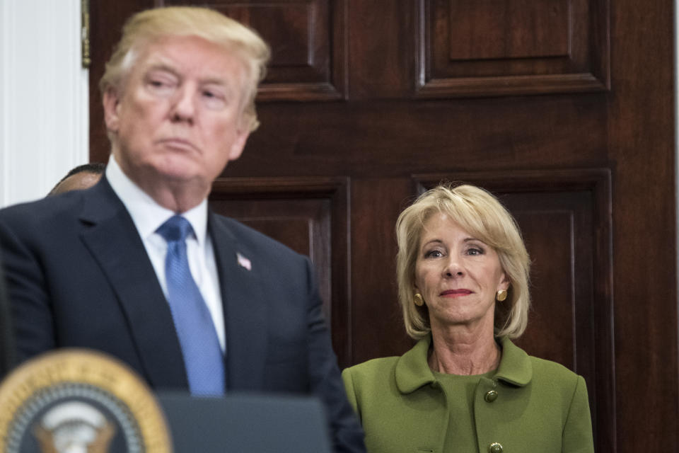 President Donald Trump and Education Secretary Betsy DeVos in the Roosevelt Room at the White House in Washington, DC on Tuesday, Feb. 27, 2018. (Photo: Jabin Botsford/The Washington Post via Getty Images)